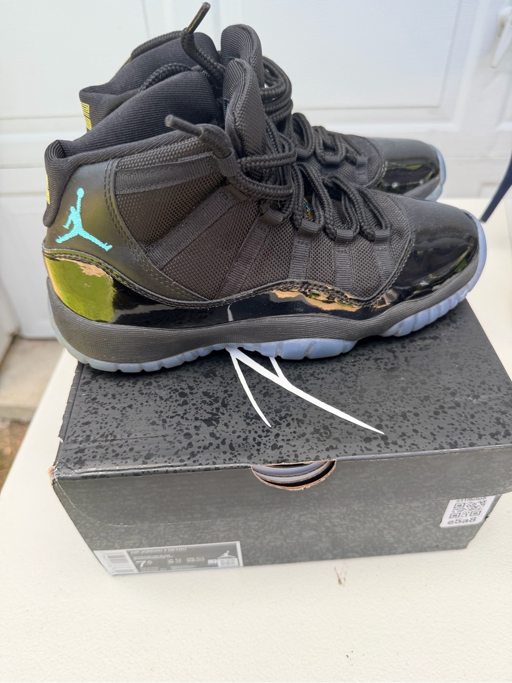 Jordan 11 Gamas Kids' Retro High-Top Sneakers in Black with Teal Jumpman